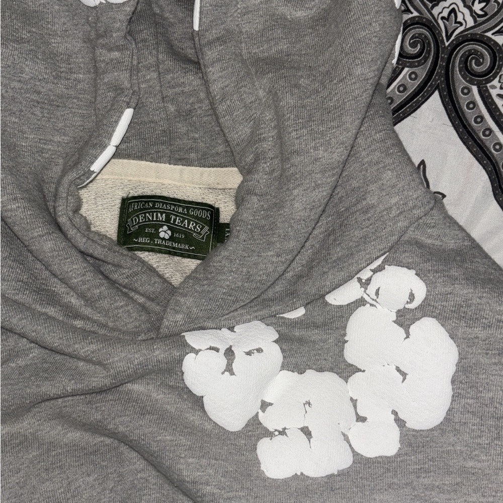 Denim Tears Gray Hoodie with White Floral Design
